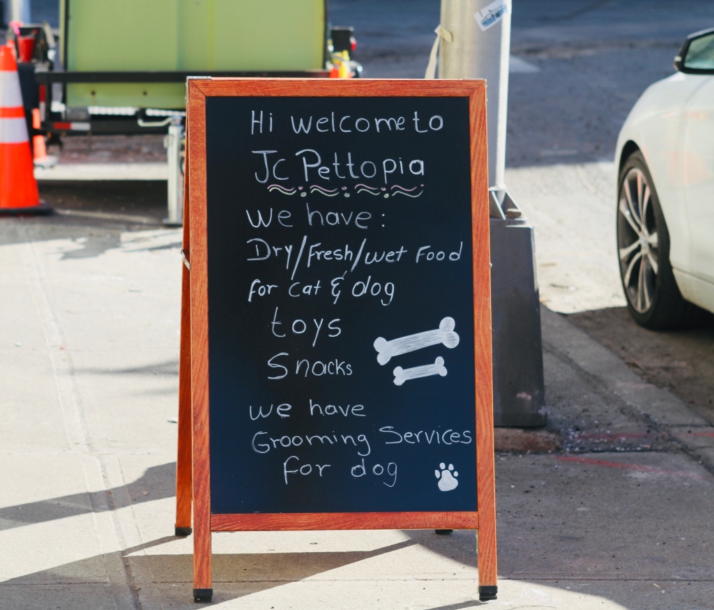 Dog care business sign